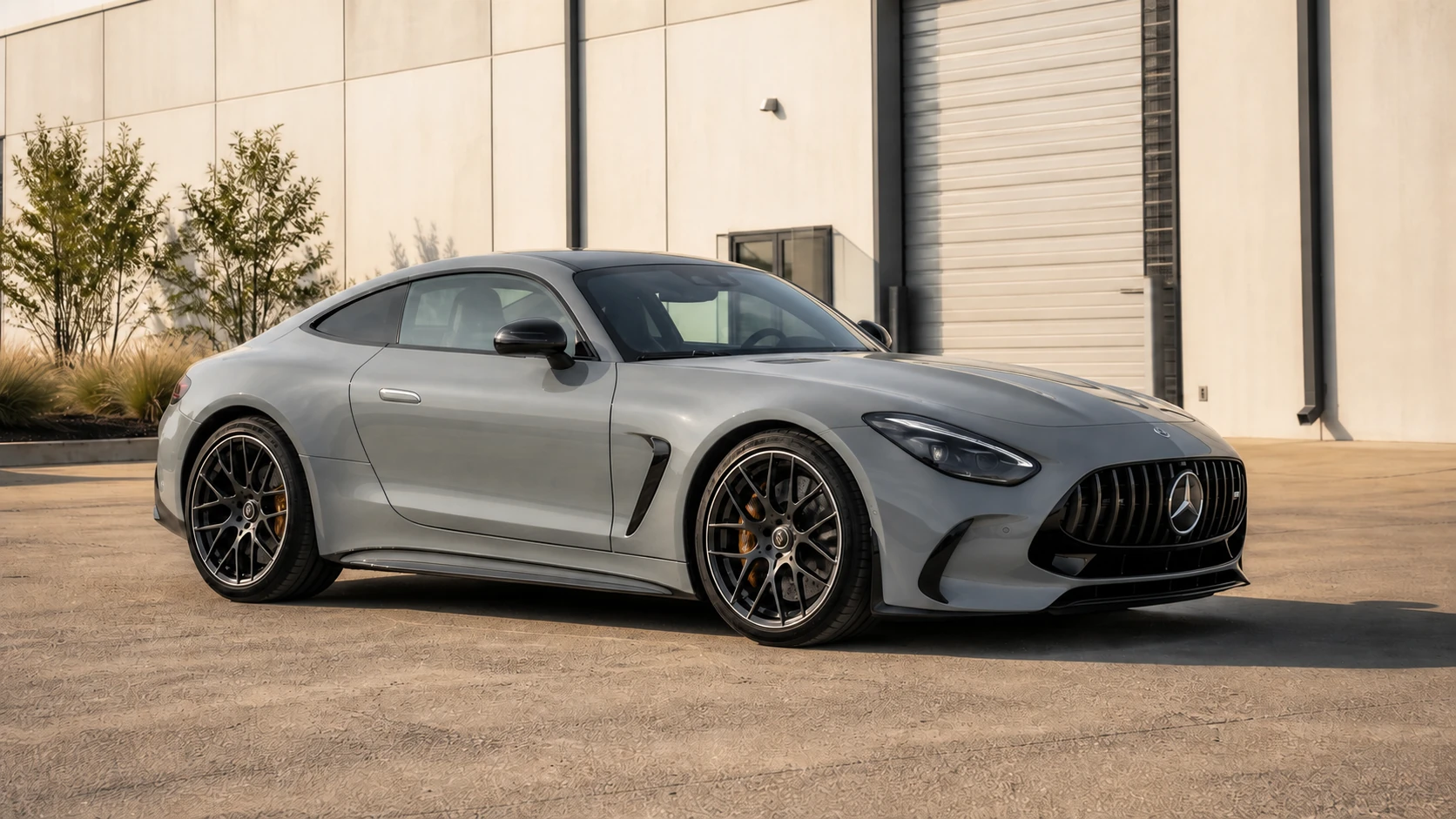 Gray C192 Mercedes-AMG GT coupe outside an industrial building for Cedar Performance tuning