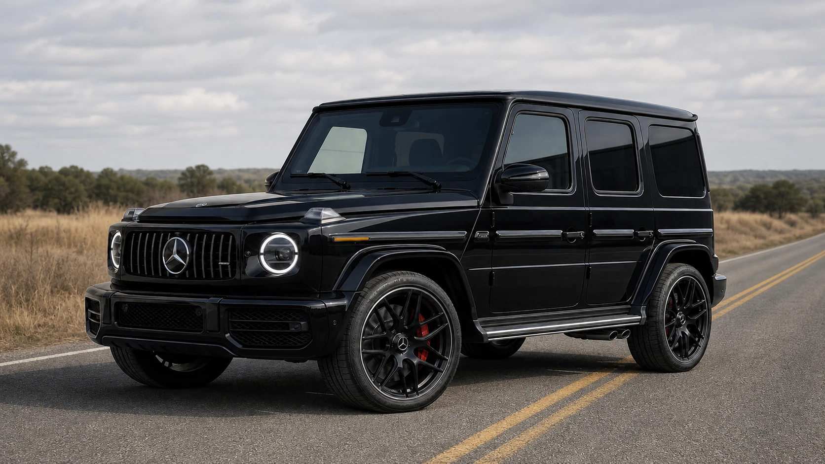 Black W463A Mercedes-AMG G63 on a quiet rural road